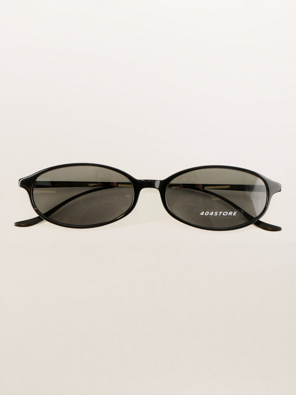 Y2K Office Siren Oval Titanium Sunglasses