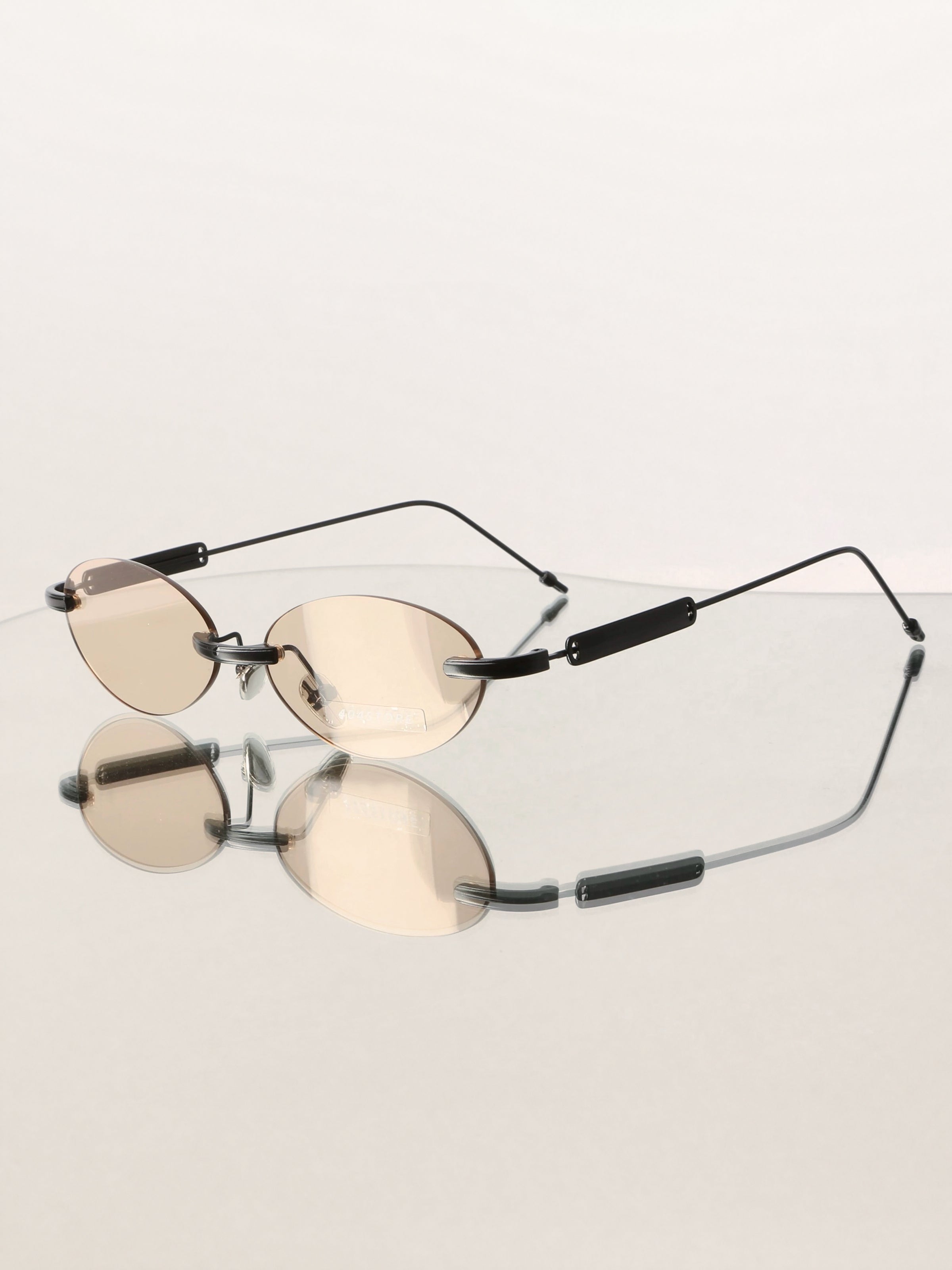 Slim Rimless Oval Metal Sunglasses