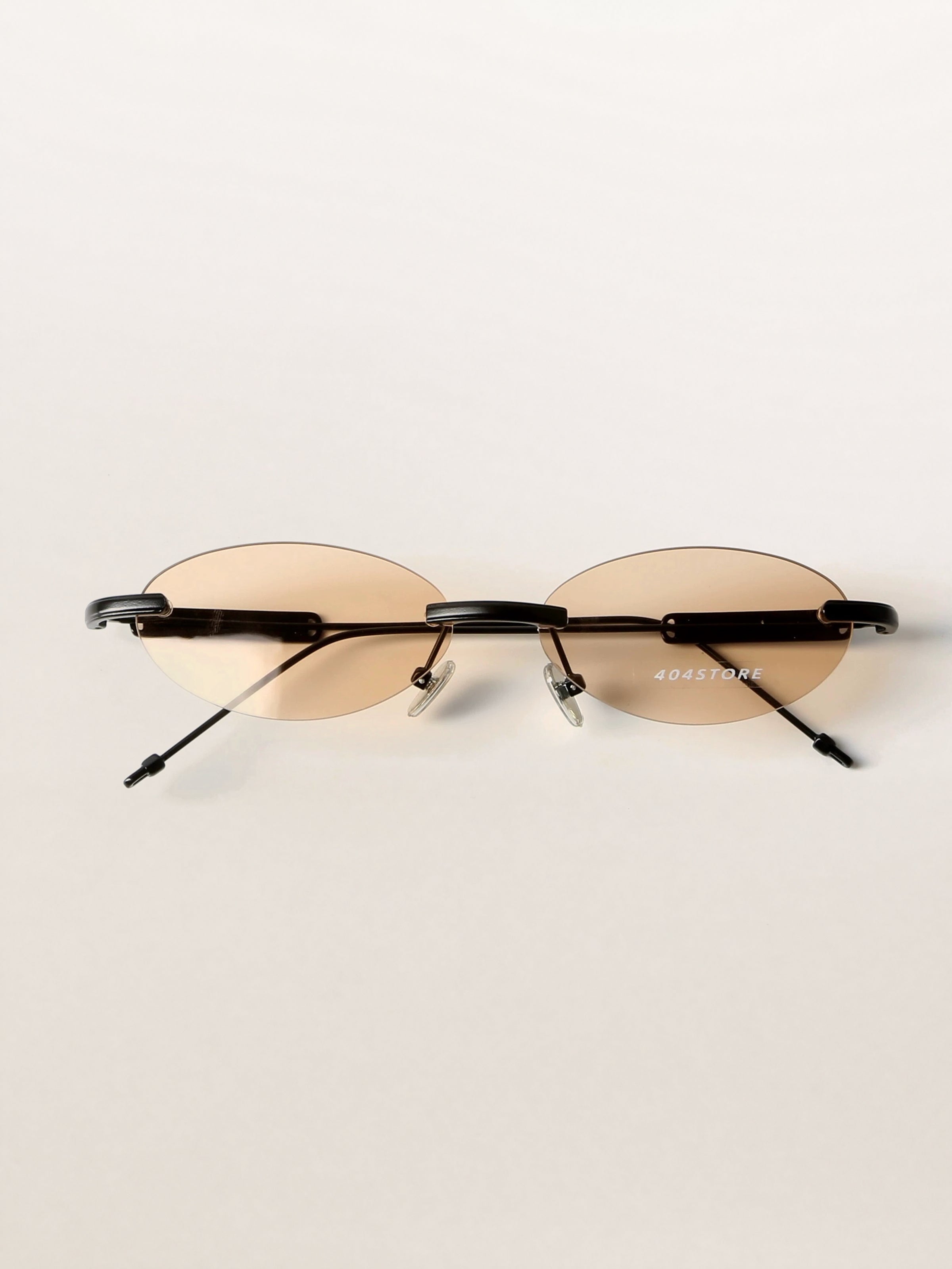 Slim Rimless Oval Metal Sunglasses