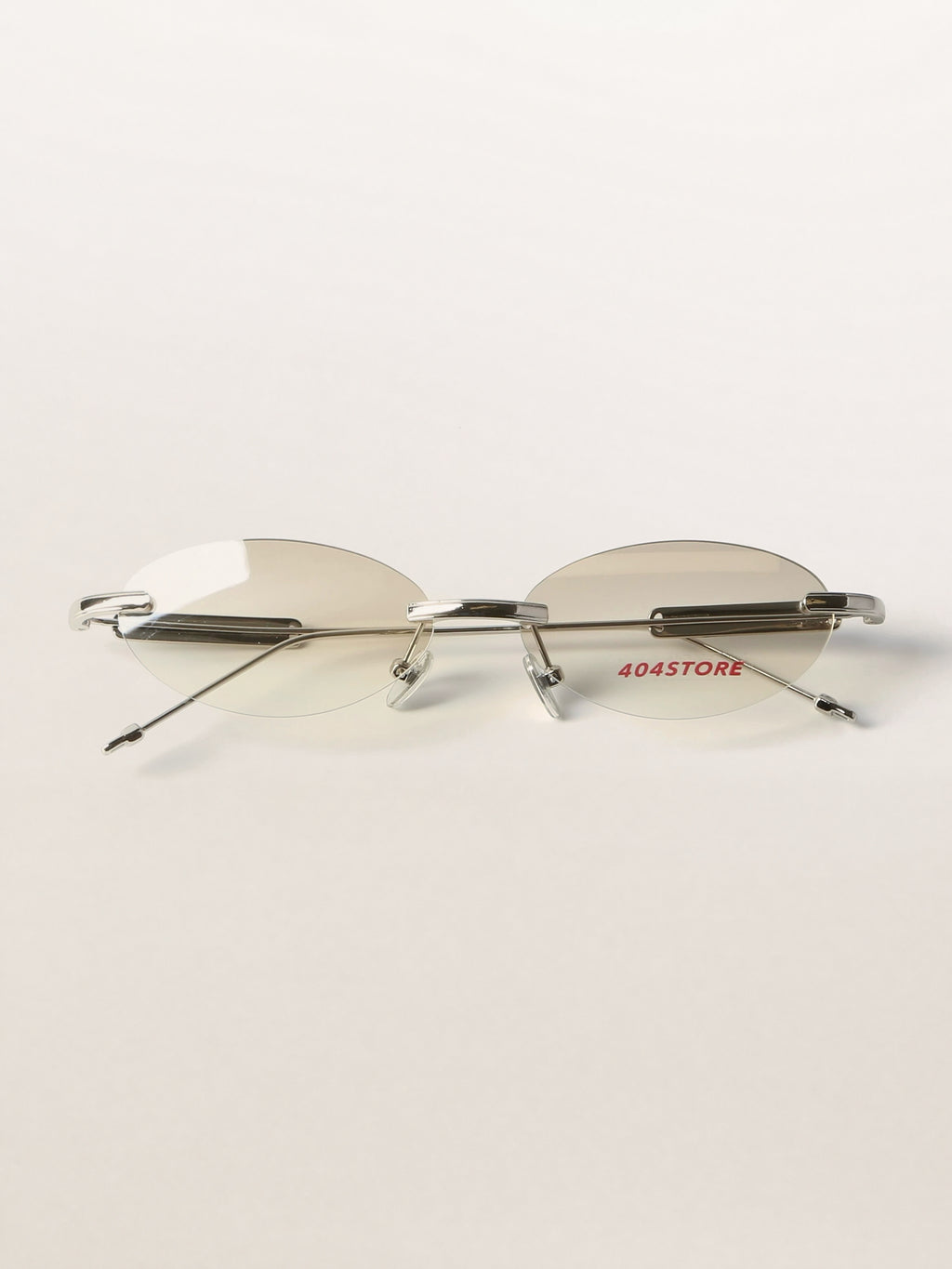 Slim Rimless Oval Metal Sunglasses