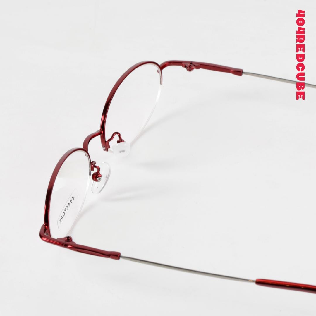 Ruby Accent Rimless Oval Metal Optical Frames